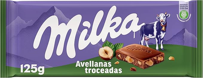 Milka Tableta de Chocolate con Leche de los Alpes y Trozos de Avellanas, 125 g